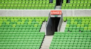 Coca Cola logo in football stadium